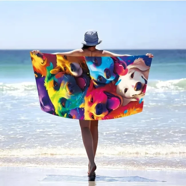 Ręcznik plażowy z mikrofibry 100x180 cm z gęstym, neonowym nadrukiem uśmiechniętych, tęczowych psów.